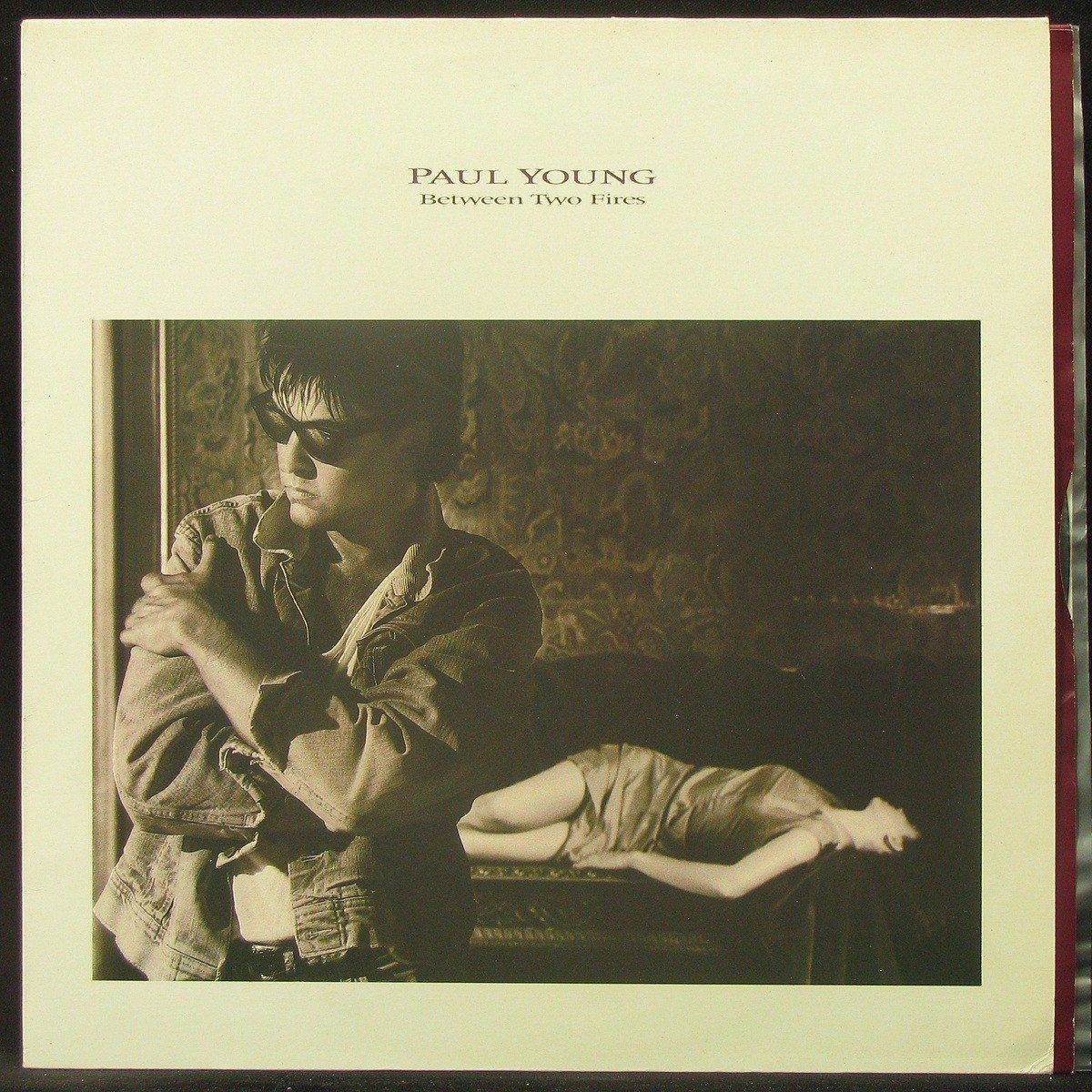LP Paul Young — Between Two Fires фото