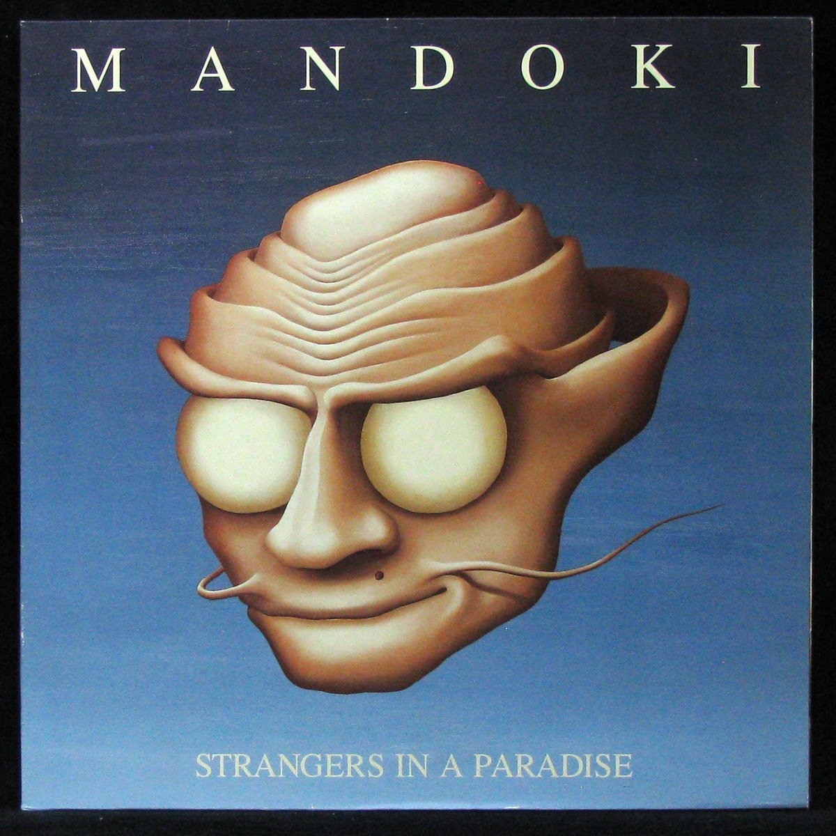 LP Mandoki — Strangers in A Paradise фото
