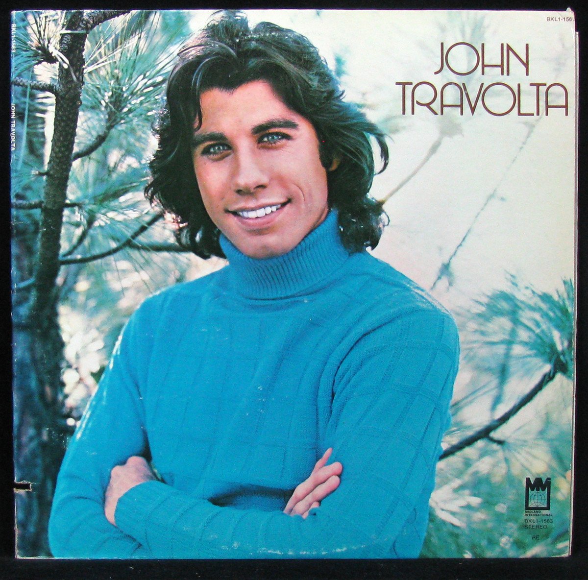 LP John Travolta — John Travolta фото