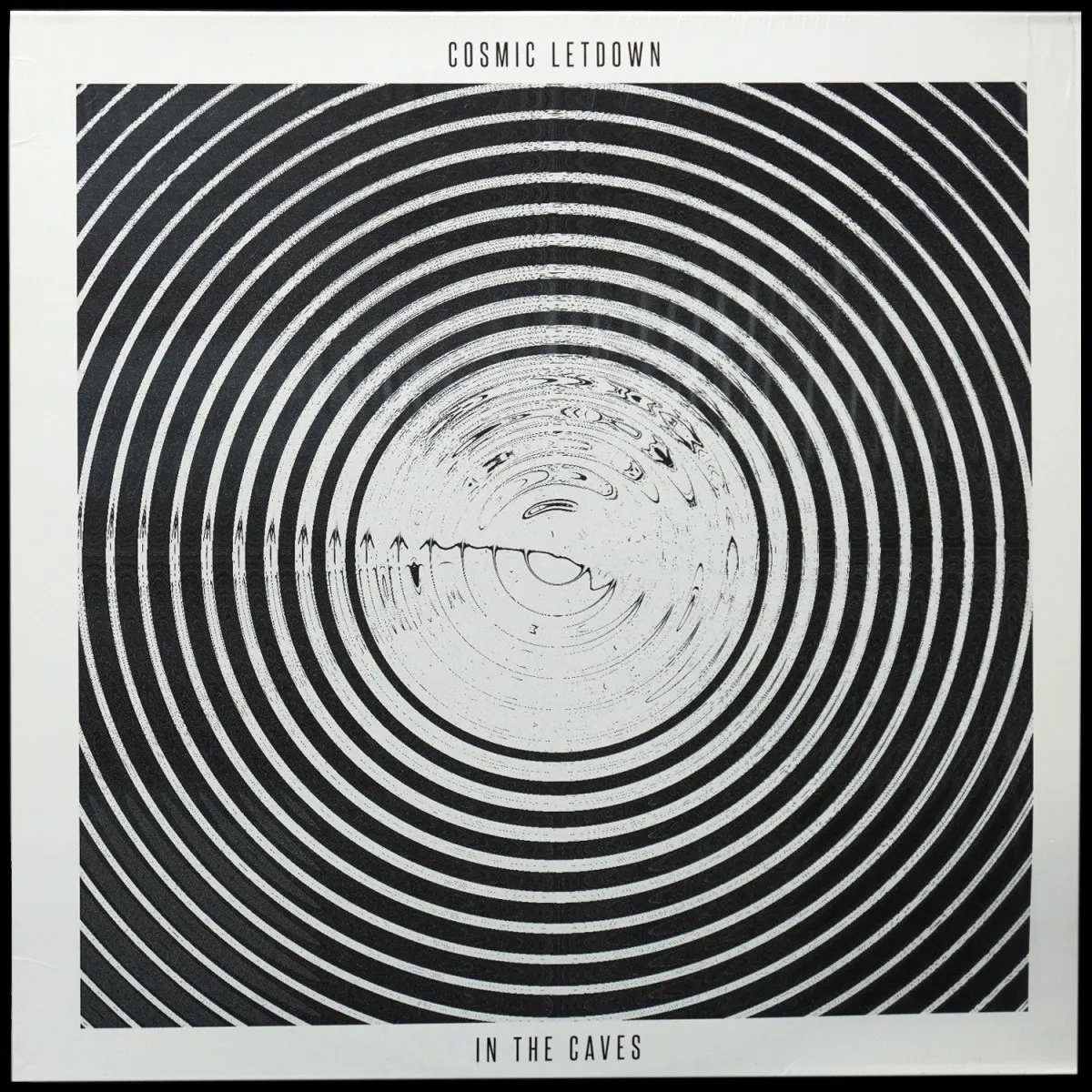 LP Cosmic Letdown — In The Caves фото