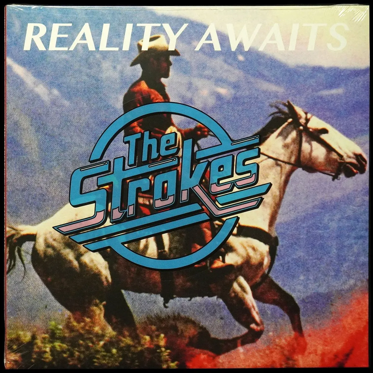 LP Strokes — Reality Awaits (+ постер) фото